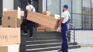 Image of storage specialist carrying furnitures