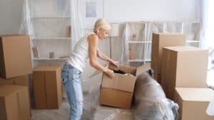 a person opening a box after a stress-free moving